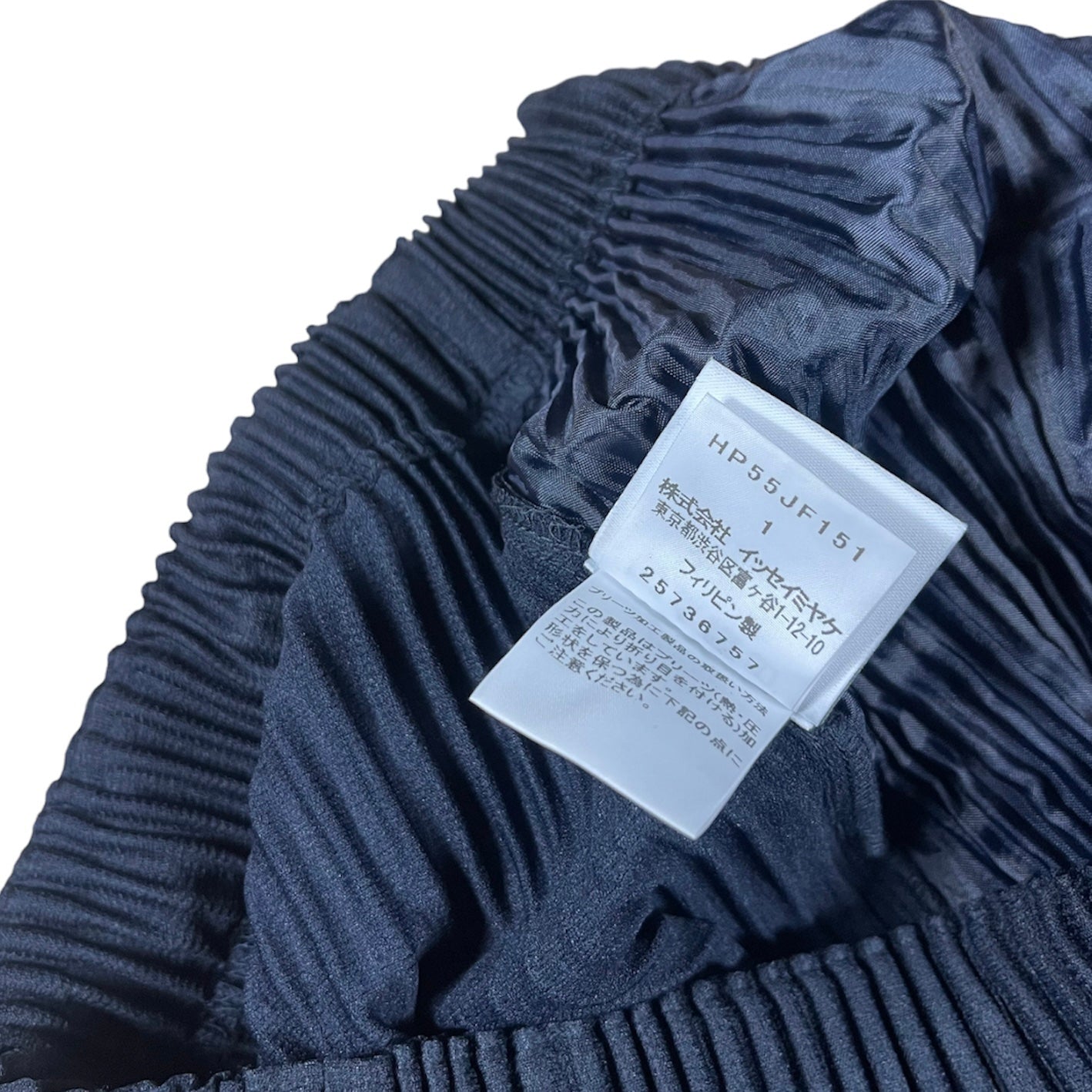 ISSEY Pleats Please Issey Miyake Tapered technical-pleated trousers