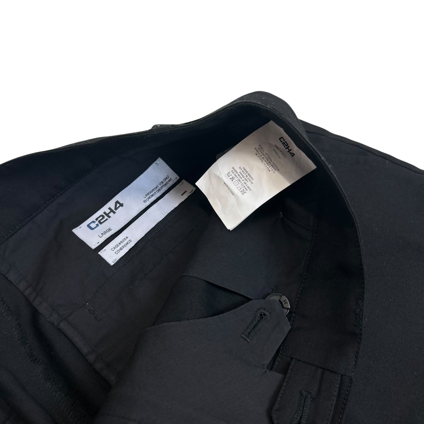 C2H4 Solemn multi pockets flared trousers
